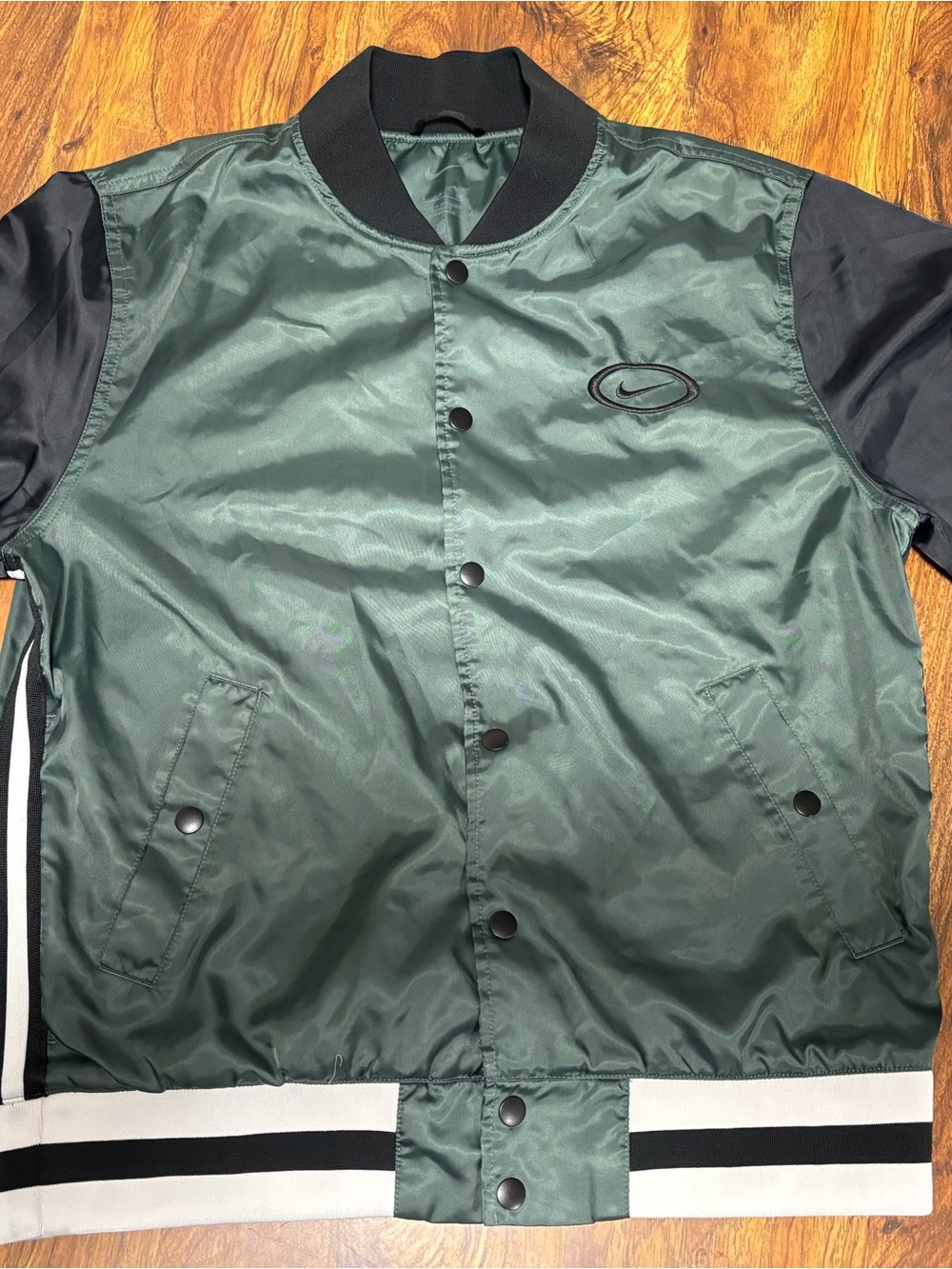 Nike Men's DNA Repel Basketball Jacket in the "Vintage Green/Black"